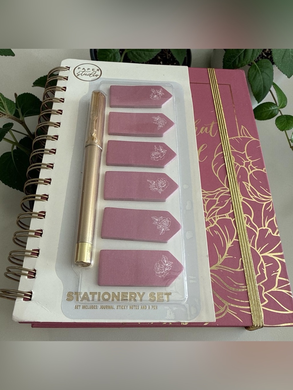 Pink Stationery Set with Gold Pen and sticky notes.